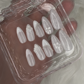 White Pearl Floral handmade press-on nails are designed for a soft, elegant salon-quality manicure at home. This set features a glossy white and sheer nude base with delicate 3D floral details, pearl accents, and lace-inspired nail art for a romantic feminine look. Perfect for brides, engagements, weddings, bridal showers, Eid, parties, and elegant everyday wear, these reusable press-on nails give you a polished manicure without a salon visit.