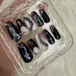 Midnight Crystal handmade press-on nails are designed for a bold, luxury salon-style manicure at home. This set features glossy black, white, and smoky marble nail art with silver chrome line details and crystal accents for a dramatic statement look. Perfect for evening events, parties, dinners, photoshoots, Eid, and special occasions, these reusable press-on nails give you a polished, high-fashion manicure without a salon appointment.