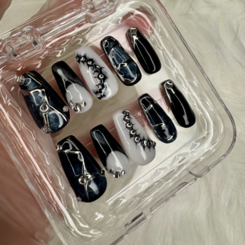 Midnight Crystal handmade press-on nails are designed for a bold, luxury salon-style manicure at home. This set features glossy black, white, and smoky marble nail art with silver chrome line details and crystal accents for a dramatic statement look. Perfect for evening events, parties, dinners, photoshoots, Eid, and special occasions, these reusable press-on nails give you a polished, high-fashion manicure without a salon appointment.